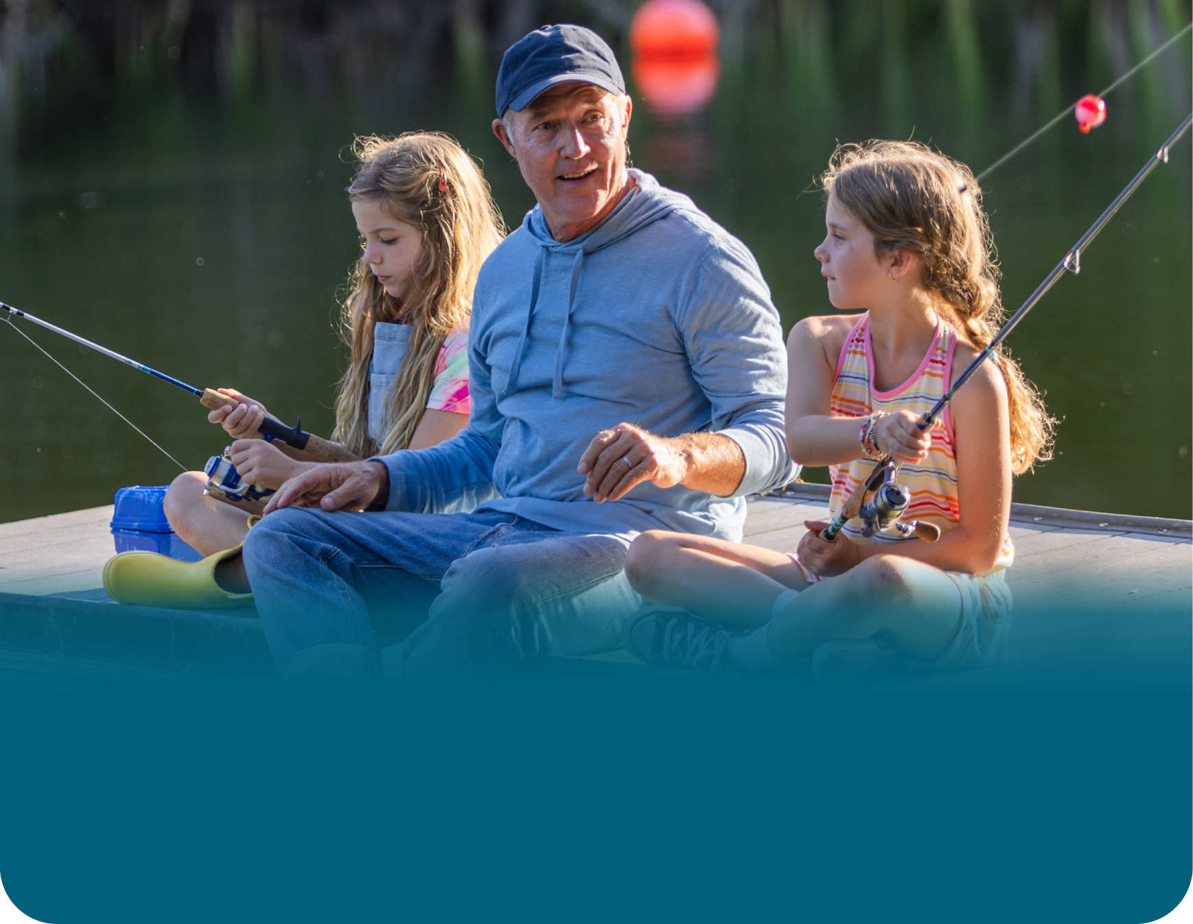 Actor portrayal of a grandfather fishing with his granddaughters